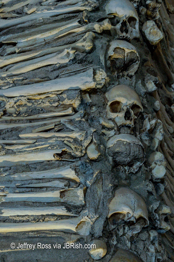 More skeletal remains in a support column